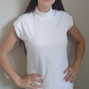 White turtleneck sleeveless top